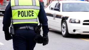 police officer walking to his patrol vehicle