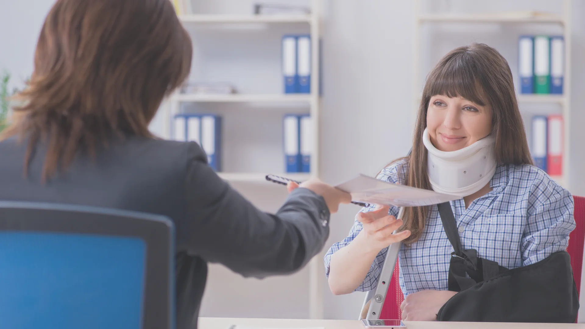 an injured woman handing her MMI medical records to her lawyer