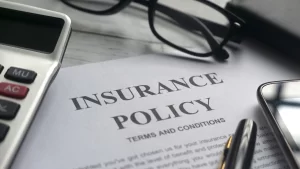 car insurance policy document with the terms and conditions of the policy