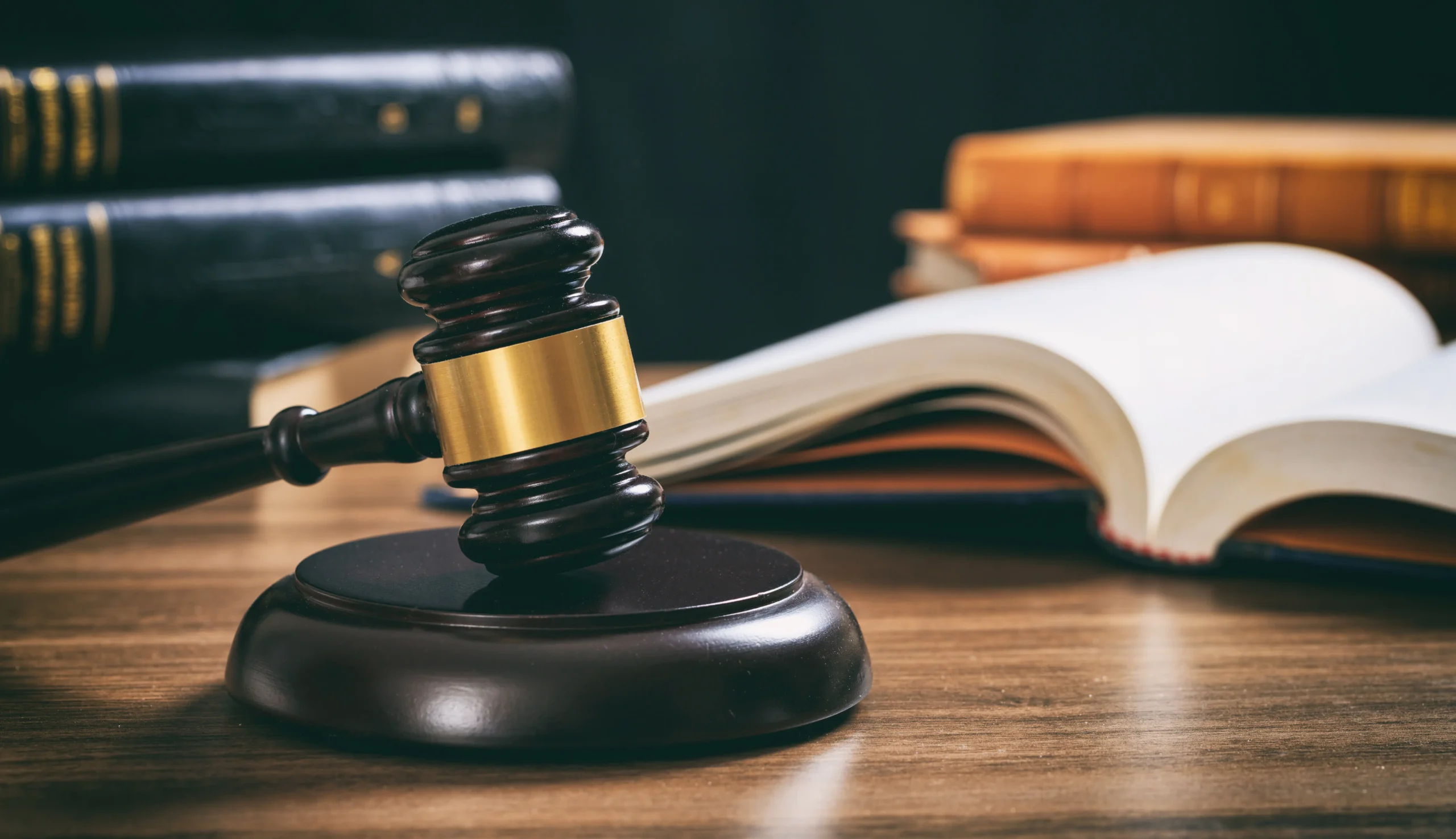 law textbooks and gavel of justice on a desk